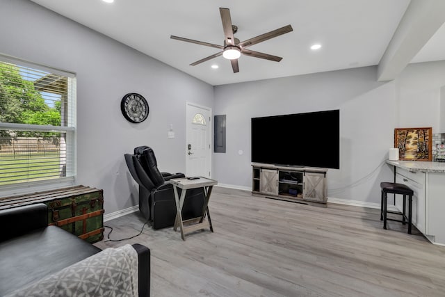 1315 Kilgore Rd, Baytown, TX 77520 - living area featuring a ceiling fan, baseboards, recessed lighting, and light wood-style floors