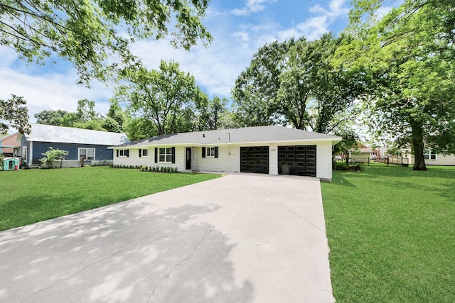 206 Hill St, Dayton, TX 77535 - single story home featuring a front yard, driveway, and an attached garage