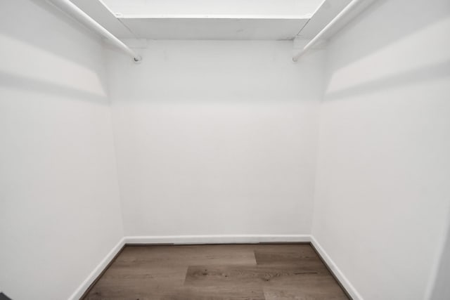206 Hill St, Dayton, TX 77535 - spacious closet with wood finished floors