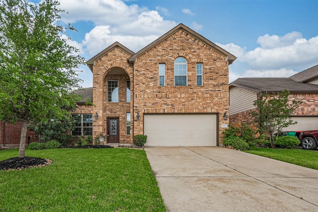 traditional-style house featuring concrete driveway, a front yard, a garage, and brick siding