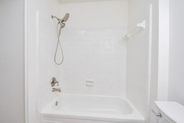 full bathroom featuring toilet and tub / shower combination