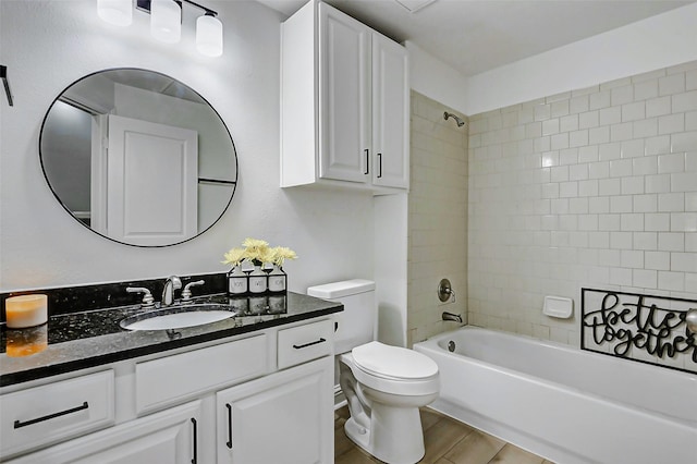 full bath featuring toilet, vanity, and shower / bathtub combination