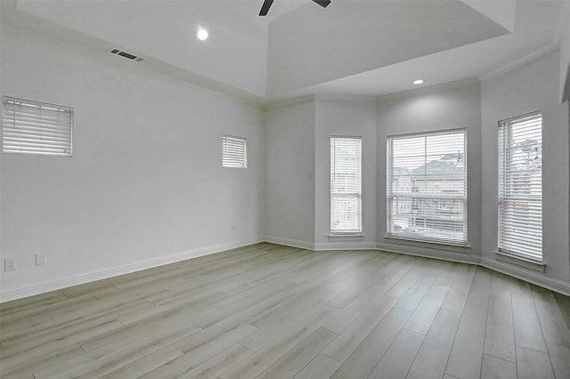 spare room with visible vents, recessed lighting, baseboards, light wood-type flooring, and a ceiling fan