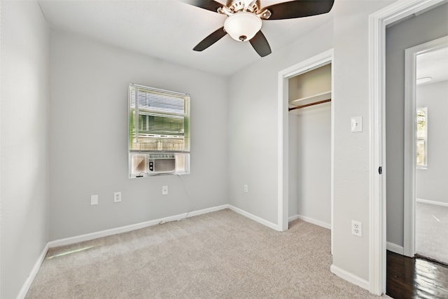2208 Victory St, Galveston, TX 77551 - unfurnished bedroom featuring multiple windows and carpet flooring