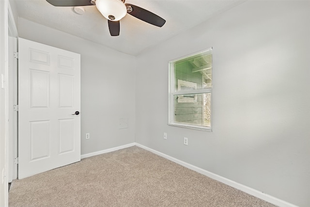 2208 Victory St, Galveston, TX 77551 - carpeted spare room featuring a ceiling fan and baseboards
