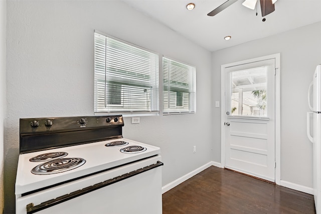 2208 Victory St, Galveston, TX 77551 - kitchen with baseboards, freestanding refrigerator, electric range oven, dark wood-style floors, and a ceiling fan
