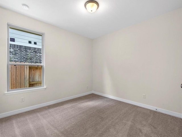 4203 Chloe Ridge Ln, Fulshear, TX 77441 - empty room featuring baseboards and carpet