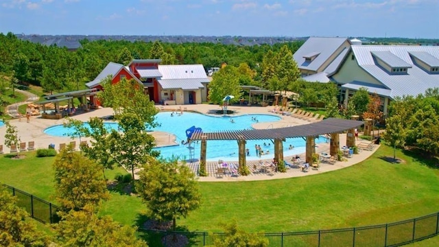 4203 Chloe Ridge Ln, Fulshear, TX 77441 - pool with a lawn, a patio, a water slide, and fence
