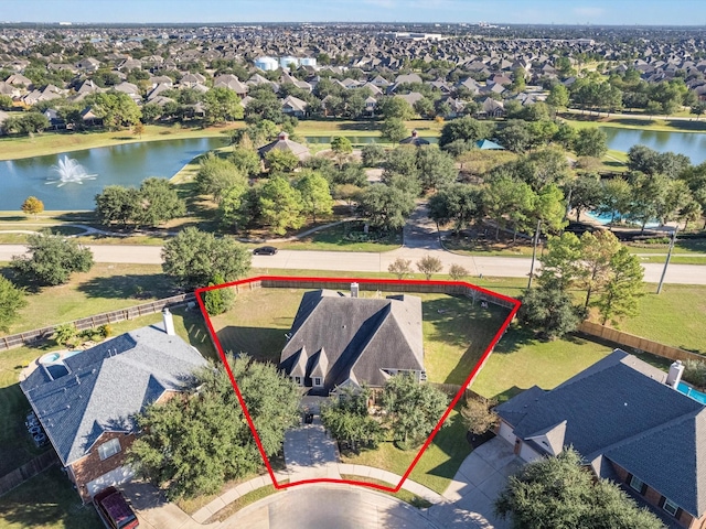 aerial view with a water view and a residential view