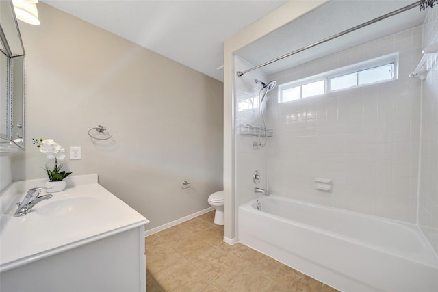 full bathroom with baseboards, toilet, shower / washtub combination, vanity, and tile patterned flooring