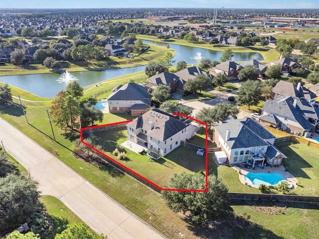 aerial view featuring a residential view and a water view