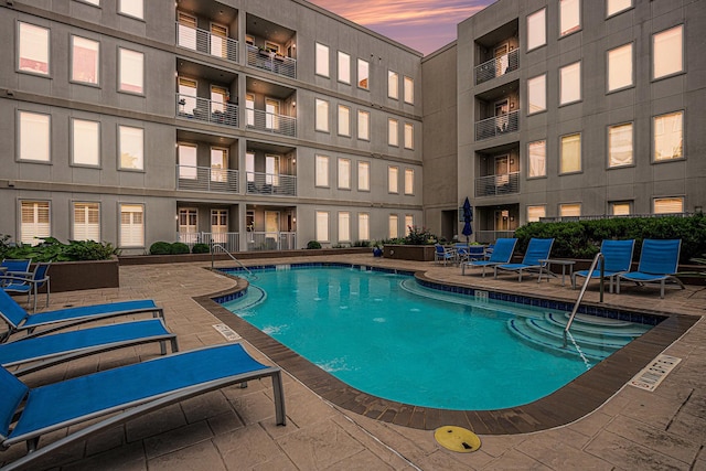 community pool with a patio