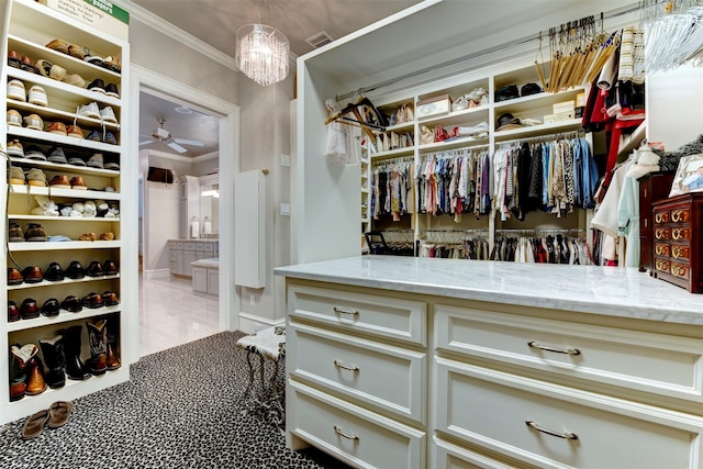 13906 Saint Marys Ln, Houston, TX 77079 - spacious closet featuring a ceiling fan