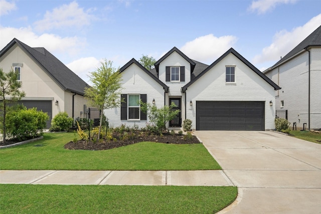 4623 Bridgewood Dr, Spring, TX 77386 - view of front of house featuring concrete driveway, an attached garage, a front yard, and brick siding