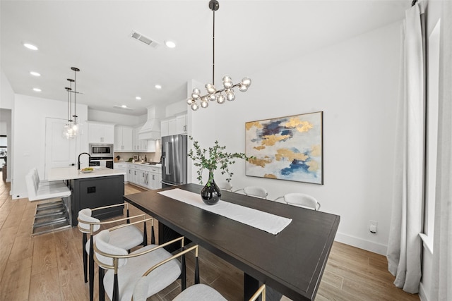 4623 Bridgewood Dr, Spring, TX 77386 - dining area with recessed lighting, baseboards, and light wood-style floors