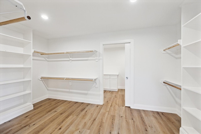 1935 Willow Rd, Wallis, TX 77485 - walk in closet featuring wood finished floors