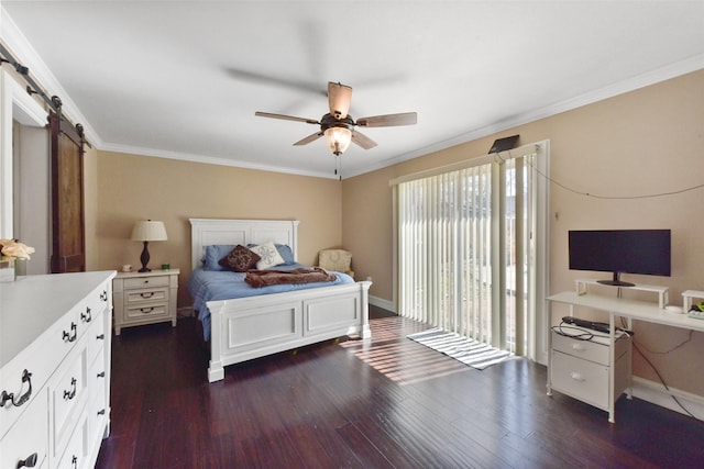 bedroom featuring access to exterior, crown molding, dark wood finished floors, a barn door, and baseboards