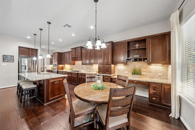 dining space featuring visible vents, baseboards, an inviting chandelier, recessed lighting, and dark wood-type flooring