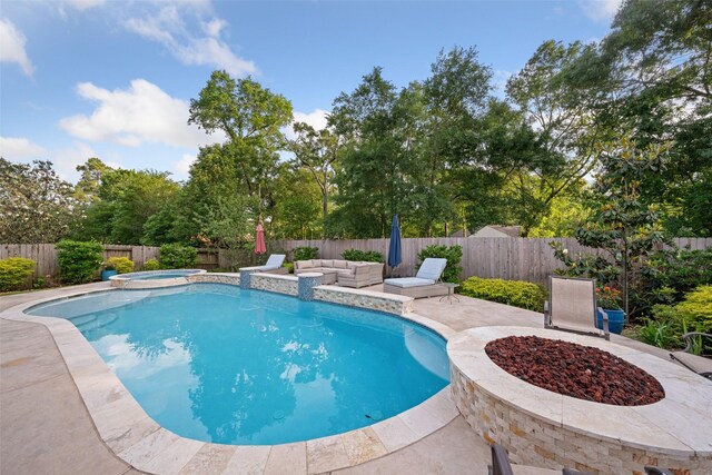 view of pool featuring a fenced in pool, a patio, an in ground hot tub, and a fenced backyard