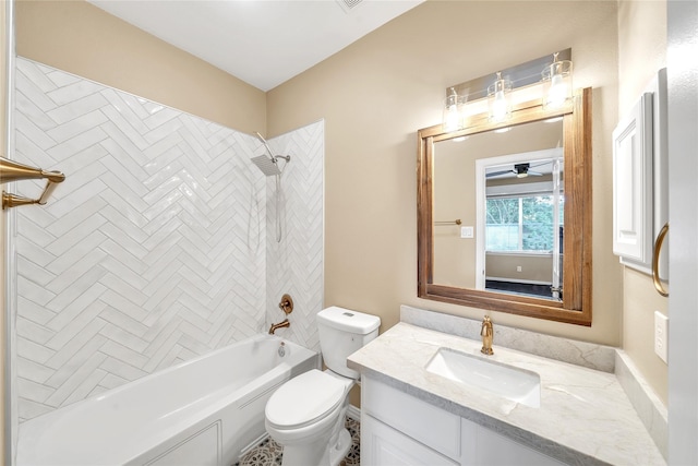 bathroom featuring vanity, shower / bathing tub combination, and toilet
