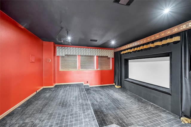carpeted cinema room with recessed lighting, baseboards, and visible vents