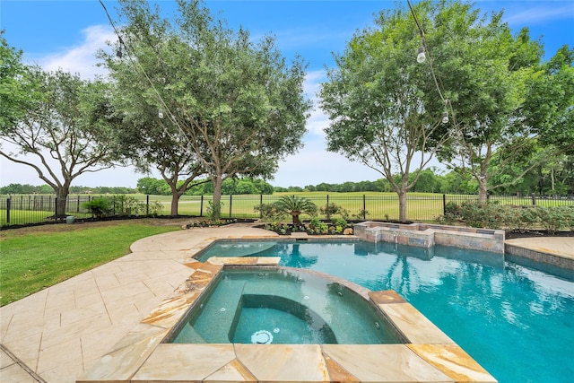 view of pool with a lawn, a fenced backyard, and a pool with connected hot tub