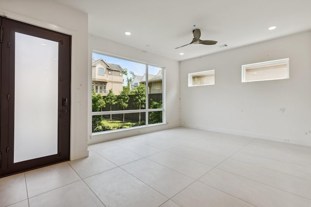 4705 Gibson St, Houston, TX 77007 - unfurnished room featuring light tile patterned floors, ceiling fan, and recessed lighting