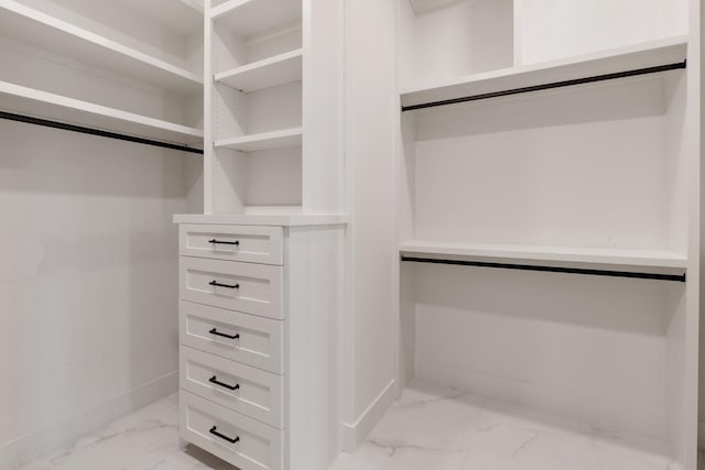 4705 Gibson St, Houston, TX 77007 - walk in closet featuring light marble finish floors