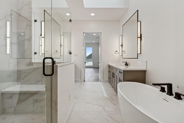 4705 Gibson St, Houston, TX 77007 - bathroom with a skylight, marble look tiles, a marble finish shower, a freestanding tub, and recessed lighting
