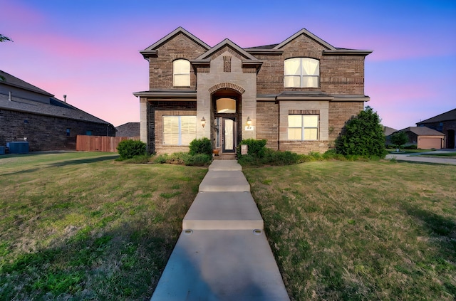 717 Willowbranch Ln, Midlothian, TX 76065 - traditional home with fence, a front lawn, and brick siding