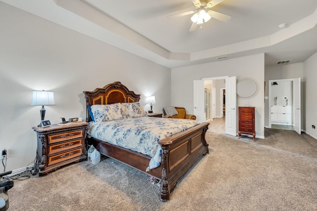 717 Willowbranch Ln, Midlothian, TX 76065 - carpeted bedroom featuring visible vents, baseboards, ceiling fan, and a tray ceiling