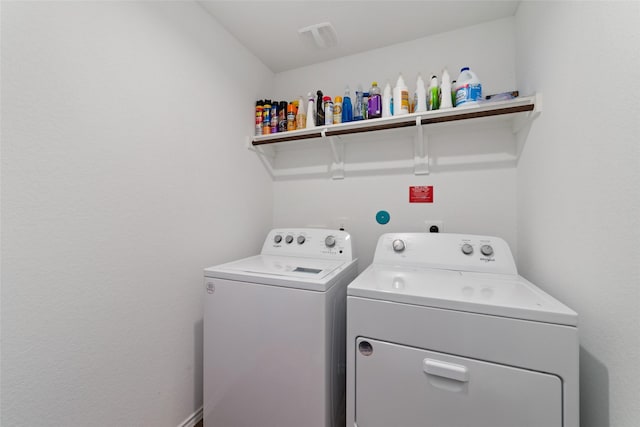clothes washing area with laundry area and washing machine and dryer