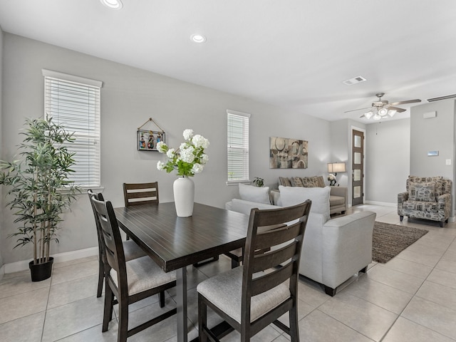 dining space with ceiling fan, recessed lighting, baseboards, light tile patterned floors, and visible vents