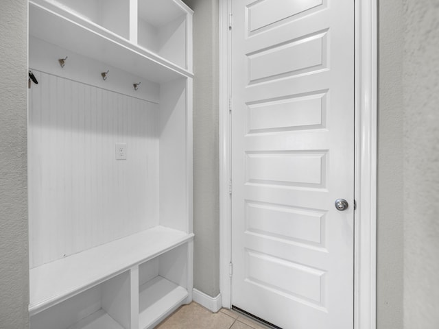 mudroom featuring light tile patterned floors