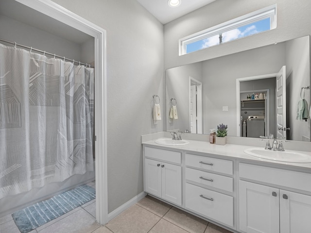 bathroom featuring double vanity, a sink, tile patterned flooring, and shower / bath combo with shower curtain