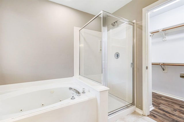 1918 N Everglades Dr, Deer Park, TX 77536 - full bath featuring a walk in closet, a tub with jets, and a shower stall