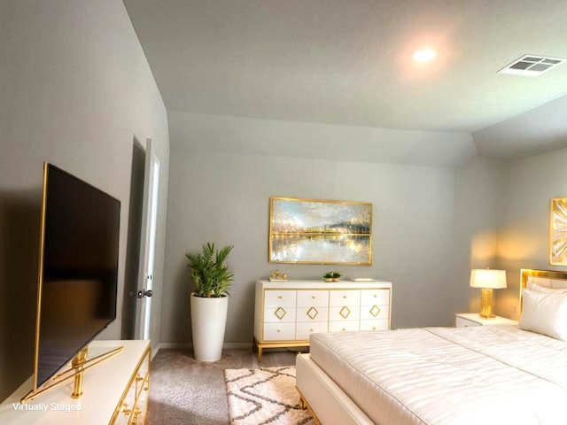 985 Harper Ln, Bryan, TX 77803 - bedroom with carpet floors, baseboards, and vaulted ceiling