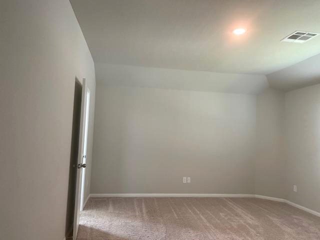985 Harper Ln, Bryan, TX 77803 - bonus room featuring light carpet, baseboards, and lofted ceiling