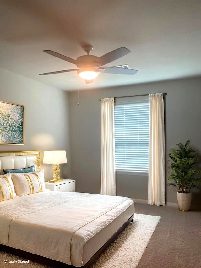 985 Harper Ln, Bryan, TX 77803 - carpeted bedroom with ceiling fan