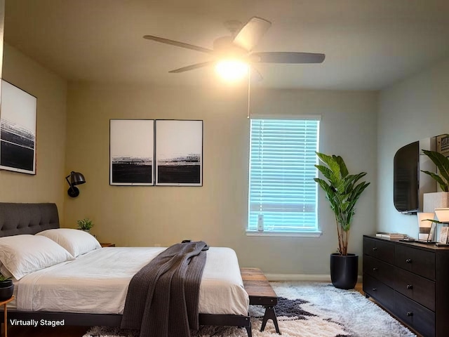 985 Harper Ln, Bryan, TX 77803 - bedroom featuring carpet flooring, ceiling fan, and baseboards