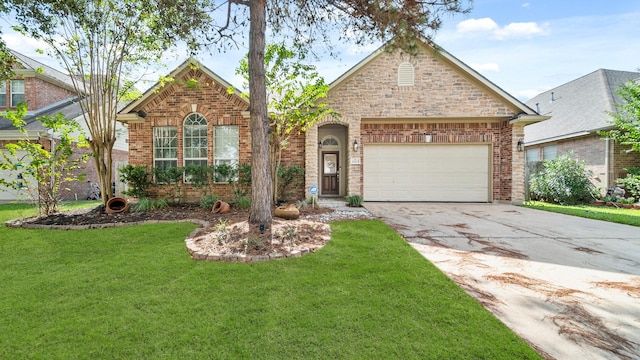 view of front of home featuring concrete driveway, a front lawn, an attached garage, and brick siding