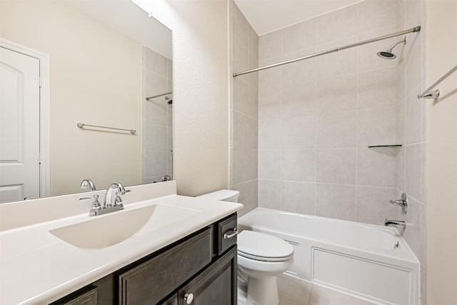full bath featuring tile patterned flooring, toilet, shower / washtub combination, and vanity