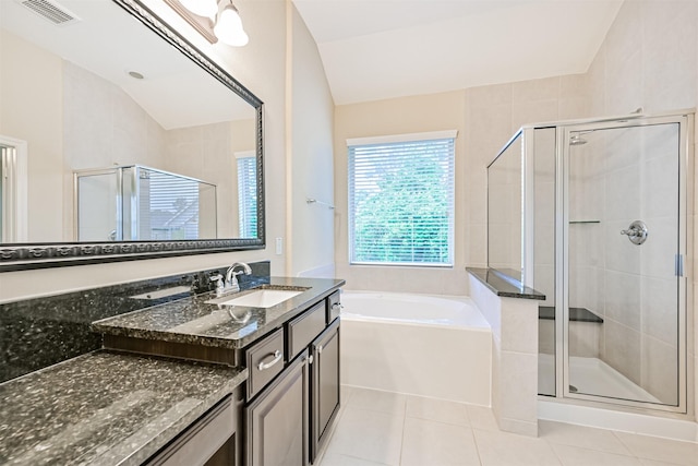 bathroom with vanity, tile patterned floors, a stall shower, visible vents, and a garden tub