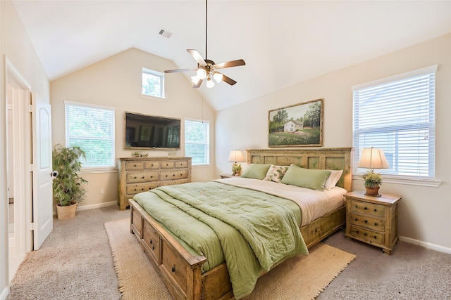 bedroom featuring baseboards, visible vents, carpet floors, and vaulted ceiling