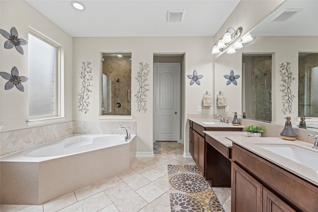 20535 Kohle Springs Ln, Cypress, TX 77433 - full bathroom with a shower stall, vanity, tile patterned floors, visible vents, and a garden tub