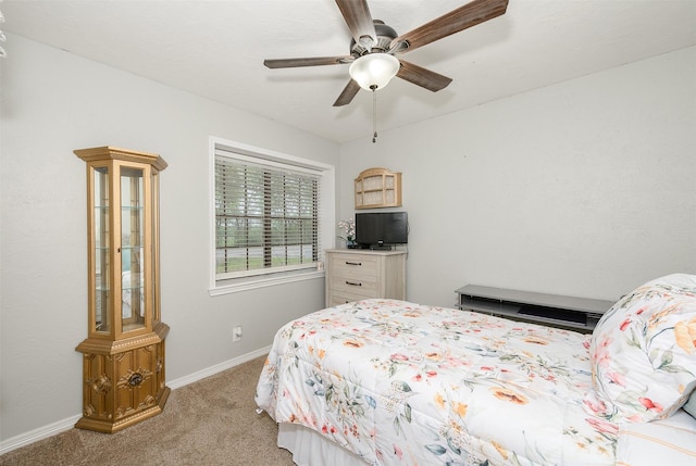 923 N Hull St, Caldwell, TX 77836 - bedroom with light colored carpet and ceiling fan