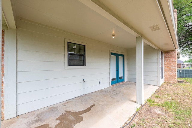 923 N Hull St, Caldwell, TX 77836 - view of patio / terrace featuring french doors