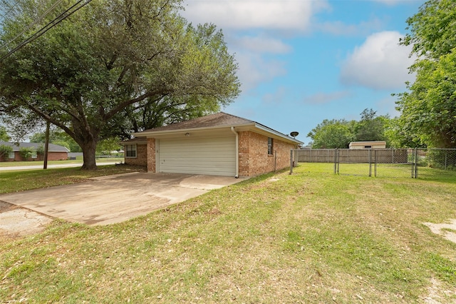 exterior space featuring fence and driveway