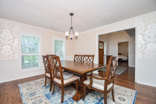 14619 Rosehill Dr, Houston, TX 77070 - dining room featuring wallpapered walls, a chandelier, wood finished floors, ornamental molding, and baseboards