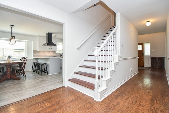 14619 Rosehill Dr, Houston, TX 77070 - stairway featuring wood finished floors
